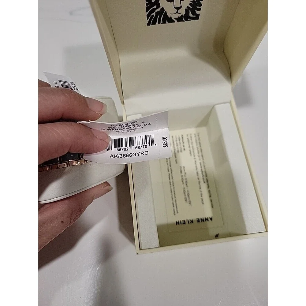 Anne Klein Women's Rose Gold-Tone and Light Pink Resin Bracelet Watch